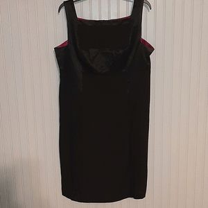 Beautiful black satin trimmed dress by Quadra 16